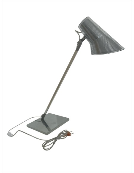 Ampoule Flos Kelvin T E27 60W en aluminium brillant (présentant de légers défauts), utilisée comme présentoir.